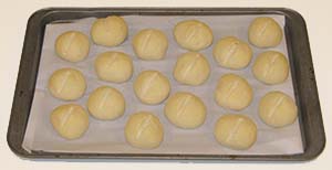 Unbaked rolls on baking pan